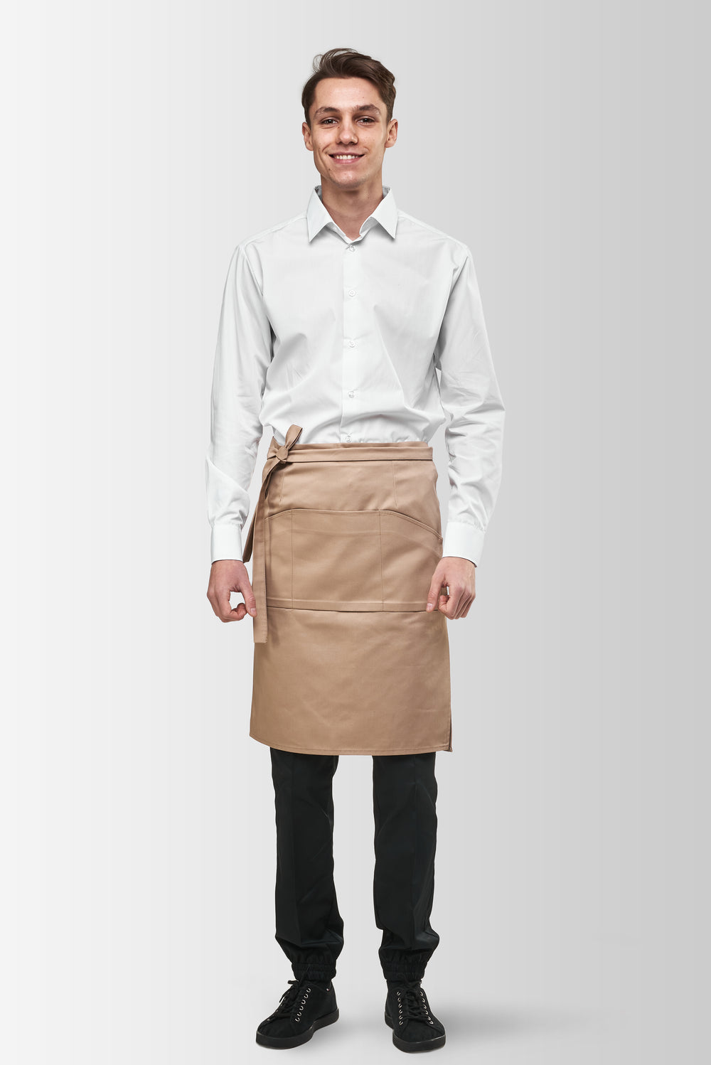 Beige Tiramisu waist apron worn by a male model, front view