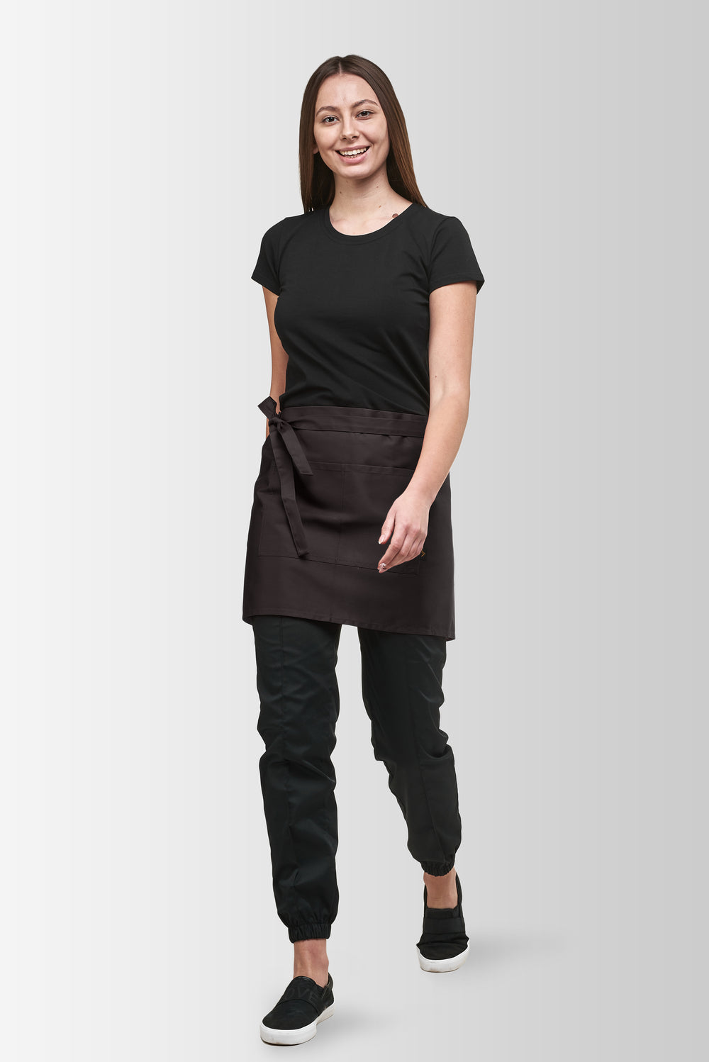 Brown Berry short waist apron worn by a female model, three-quarter front view