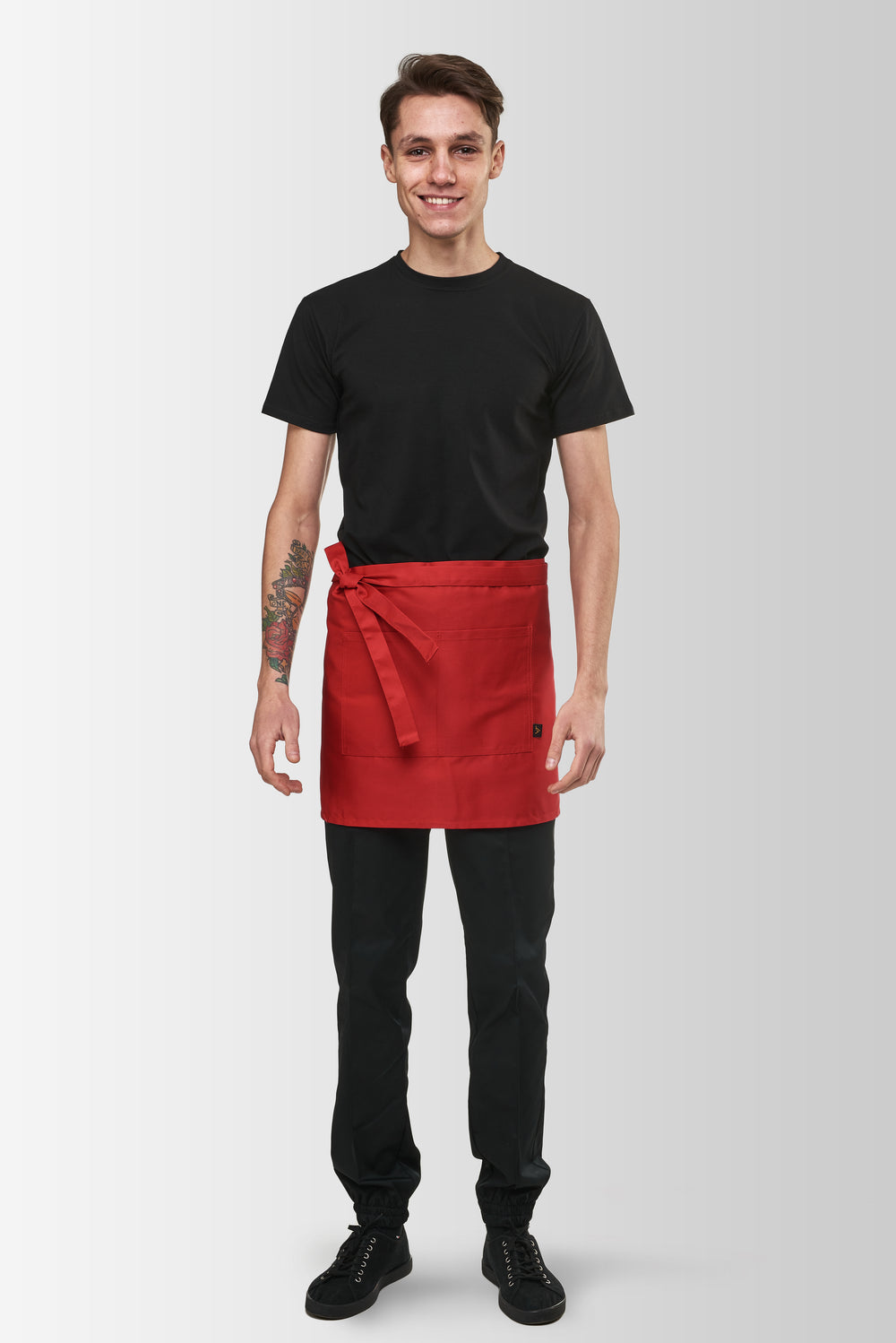 Red Berry short waist apron worn by a male model, front view
