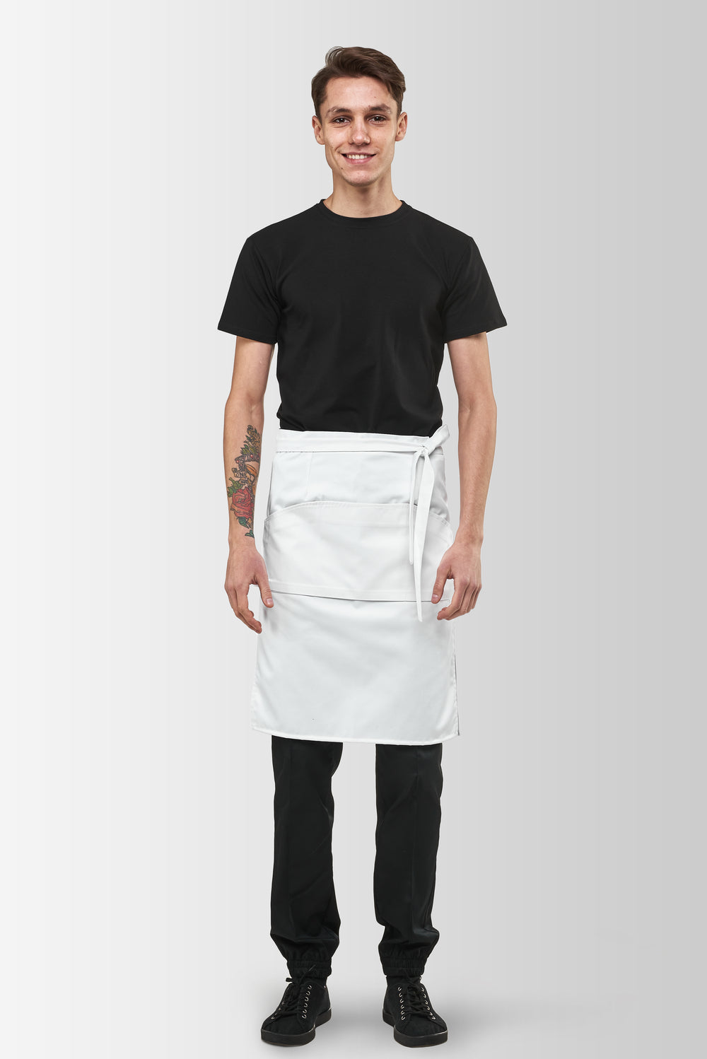 White Tiramisu waist apron worn by a male model, front view
