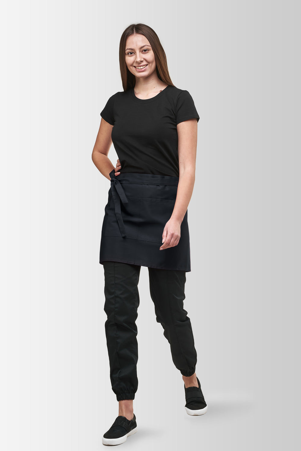 Dark Gray Berry short waist apron worn by a female model, three-quarter front view