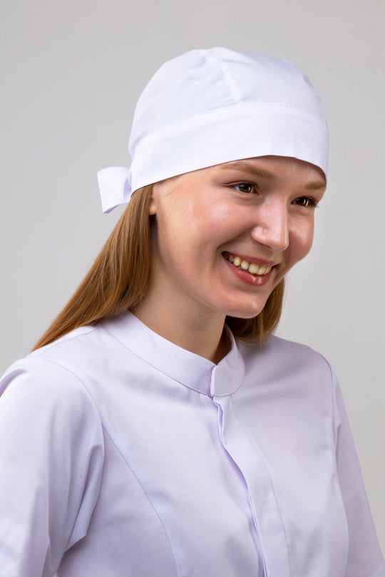 White chef bandana worn by a model, front three-quarter view