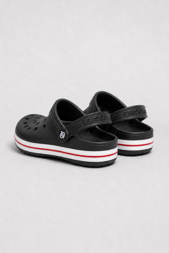Black women’s work clogs worn with white work pants