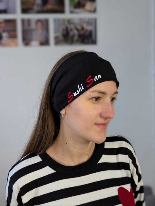 black VSETEX chef headband worn by a model, three-quarter view