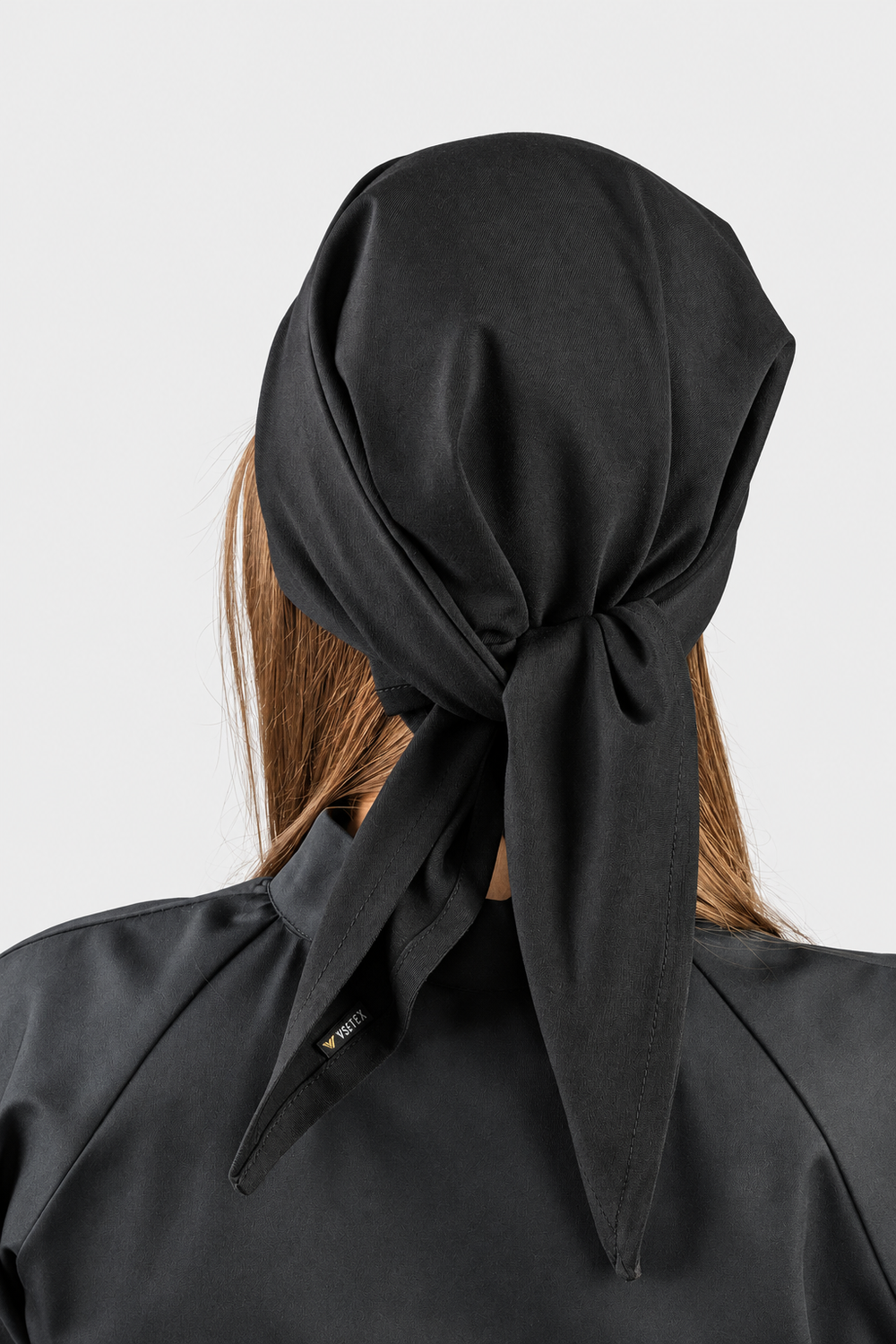 Rear view of a black VSETEX elastic chef bandana showing the knot and tie ends